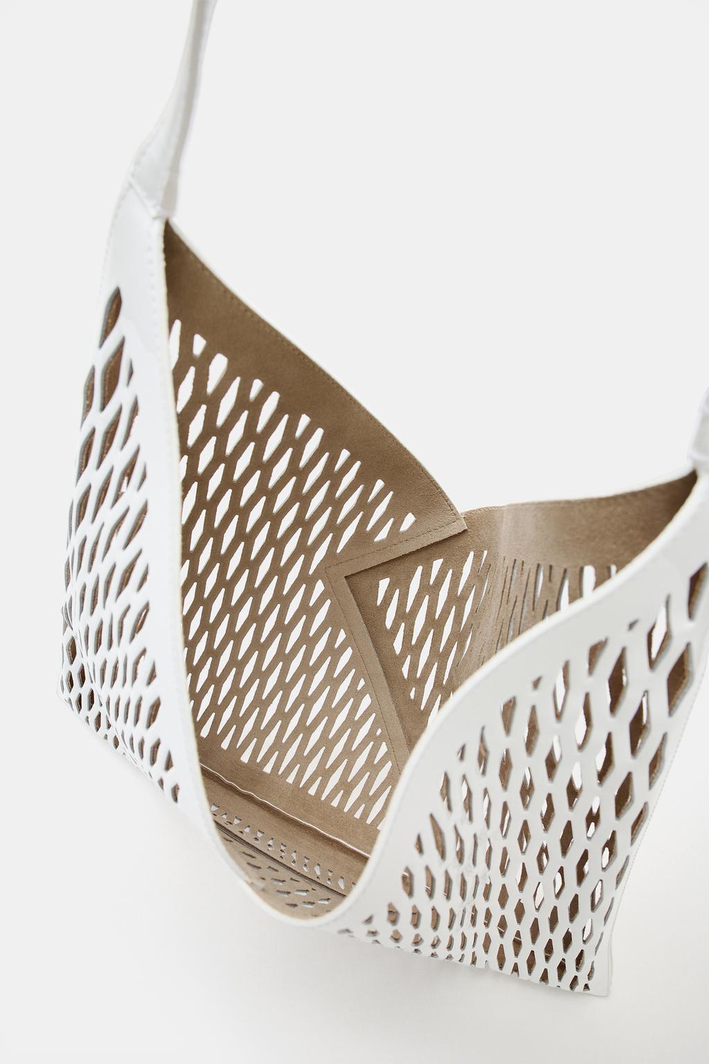 Laser-cut leather cutout shopping bag
