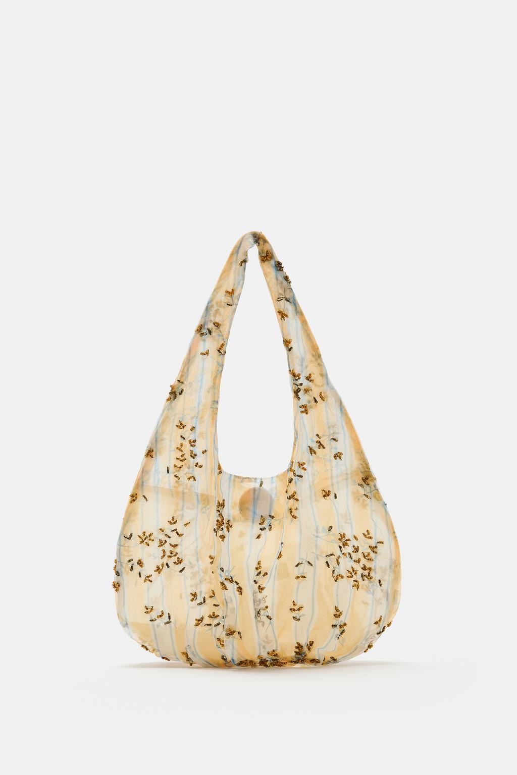 Laser-cut leather cutout shopping bag