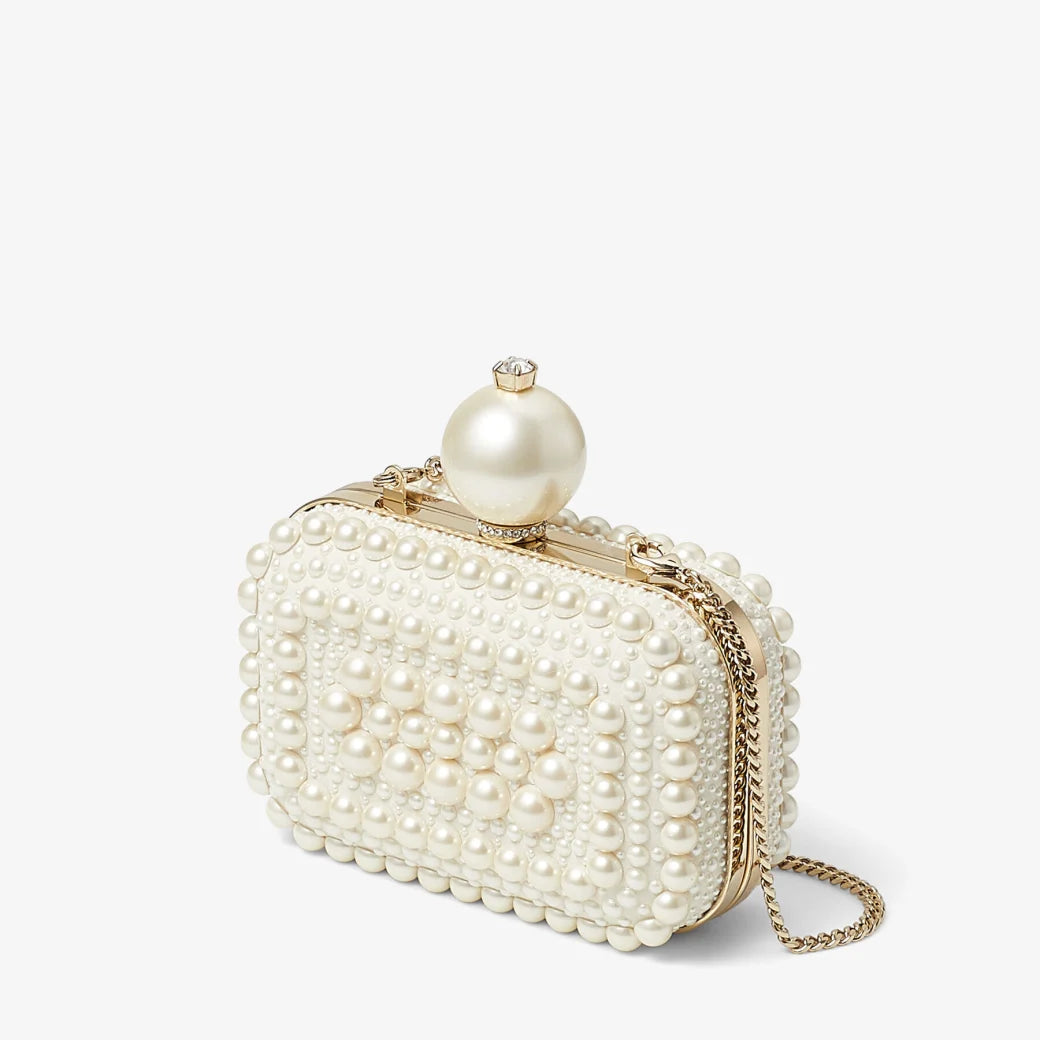 White suede clutch fully embellished with pearls