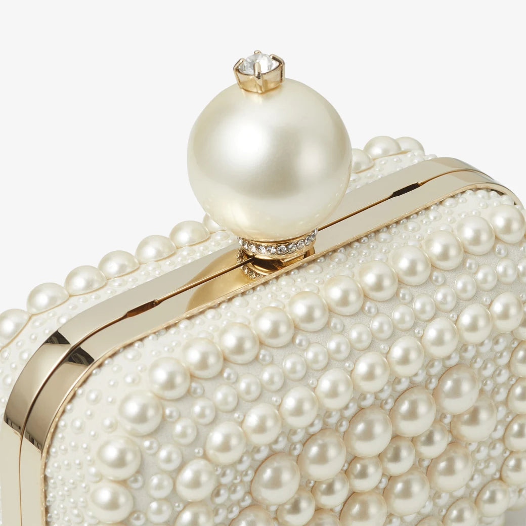 White suede clutch fully embellished with pearls