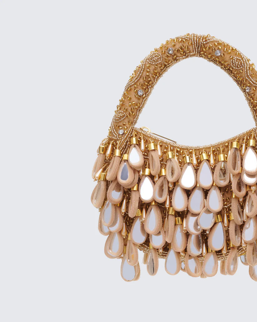 Gold teardrop-shaped mirror-finish bag