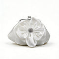 White satin evening bag with floral and rhinestone embellishments.