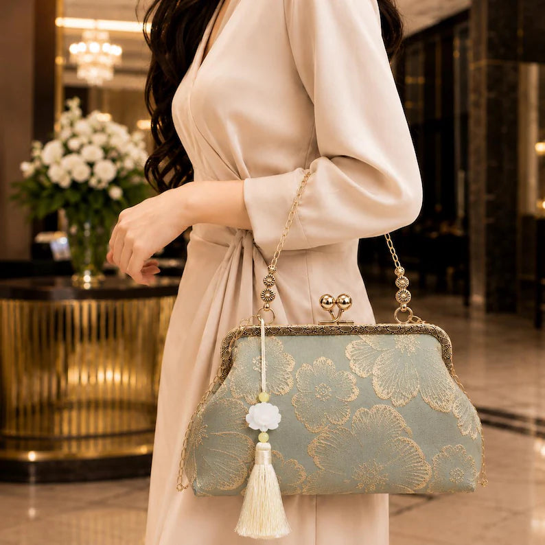 Vintage-style floral embroidered silk wedding clutch—