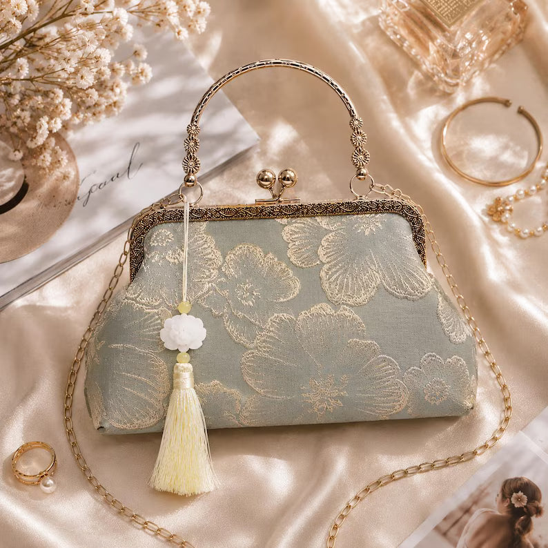 Vintage-style floral embroidered silk wedding clutch—